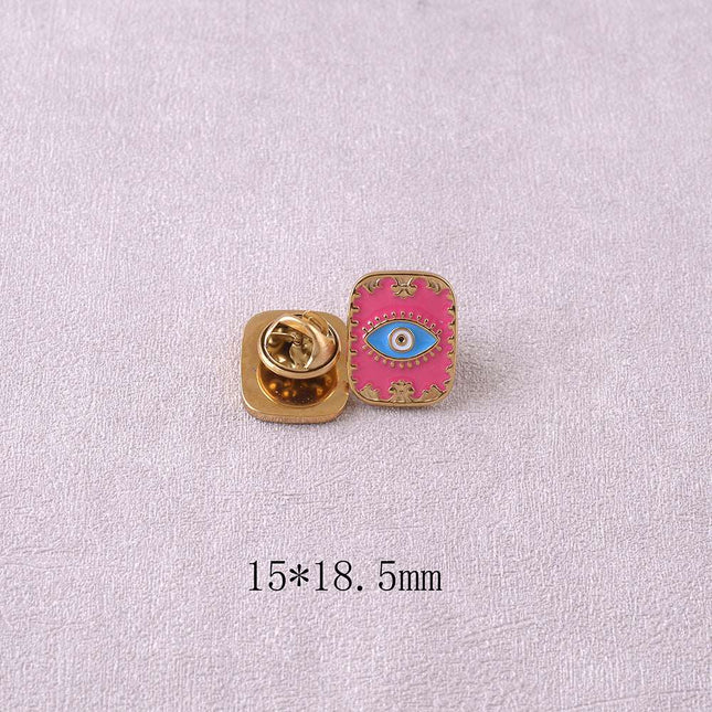 Pin's - oeil sur fond d'émail