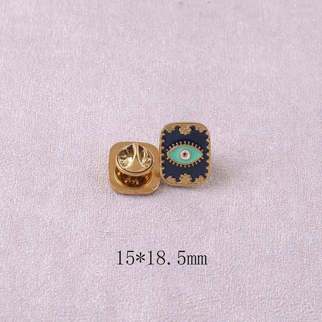 Pin's - oeil sur fond d'émail