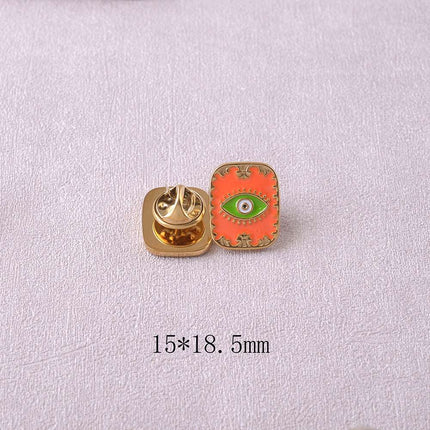 Pin's - oeil sur fond d'émail