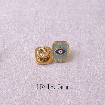 Pin's - oeil sur fond d'émail