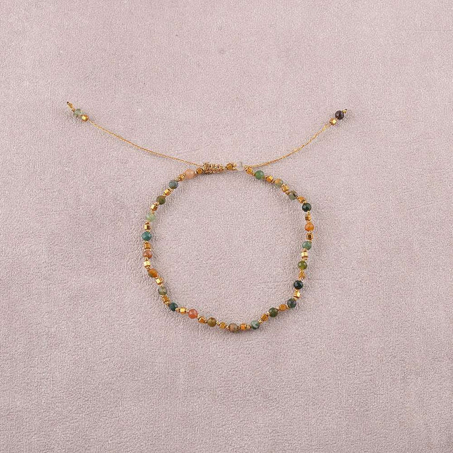Bracelet - sur fil, fermoir coulissant, fils noués, de perles carrées en acier inoxydable et de pierres naturelles taillées