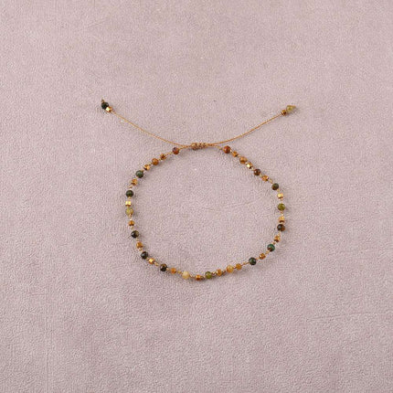 Bracelet - sur fil, fermoir coulissant, fils noués, de perles carrées en acier inoxydable et de pierres naturelles taillées