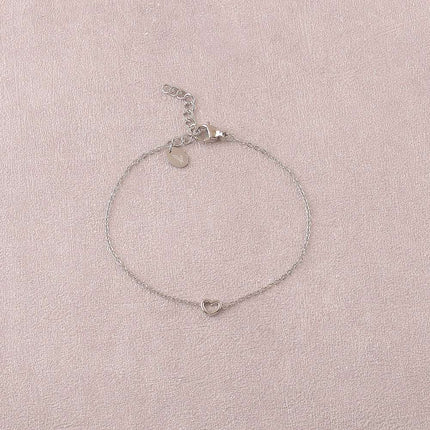 Bracelet - pendentif coeur ajouré