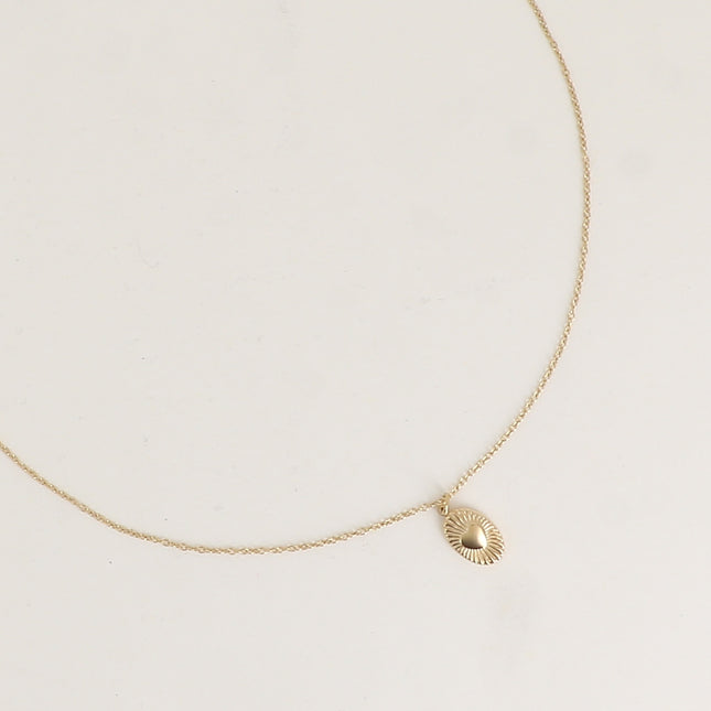 Necklace - oval pendant with heart and striated line pattern