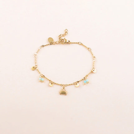 Bracelet - pastilles rondes martelées, pâtes de verre et pendentif crabe