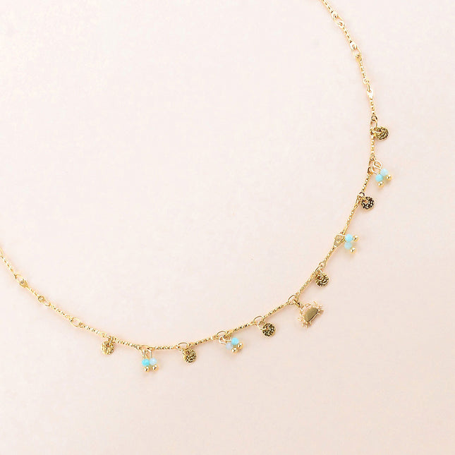 Collier - pastilles rondes martelées, pâtes de verre et pendentif crabe