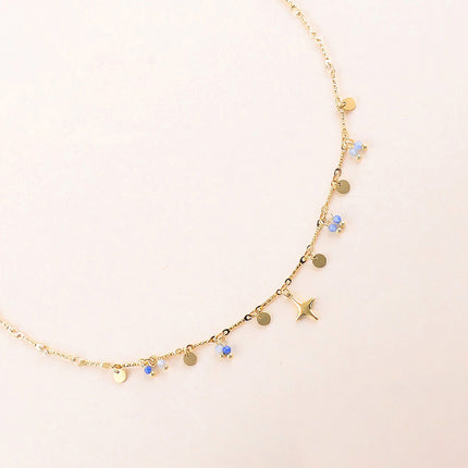 Collier - pastilles rondes martelées, pierres naturelles et pendentif étoile du Nord