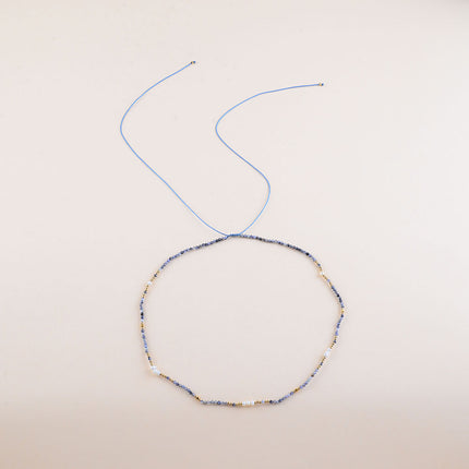Collier sur cordon - perles en acier inoxydable et pierres naturelles