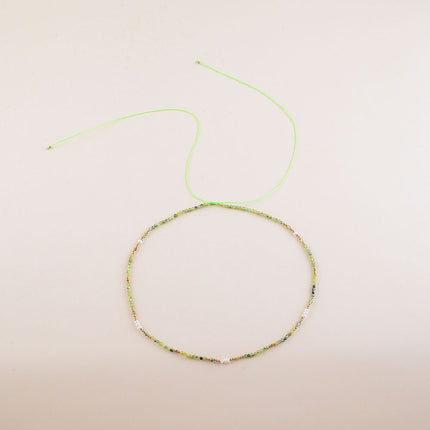 Collier sur cordon - perles en acier inoxydable et pierres naturelles