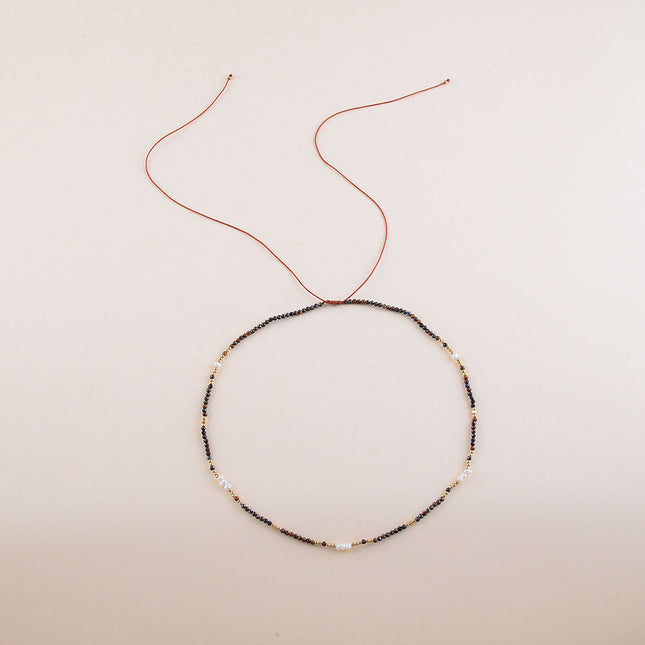 Collier sur cordon - perles en acier inoxydable et pierres naturelles