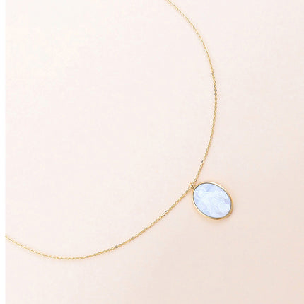 Collier - médaillon ovale et pièce nacrée de la Madone
