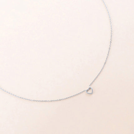 Collier - pendentif coeur strié et ajouré