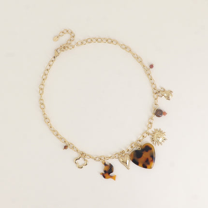 Collier - breloques (oiseau et coeur léopard, coeur milgrain, soleil, perles)
