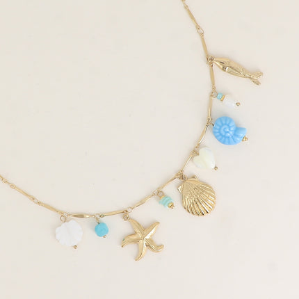 Collier - breloques (coquillages, coeur nacré, céramique émaillée, pierres naturelles)