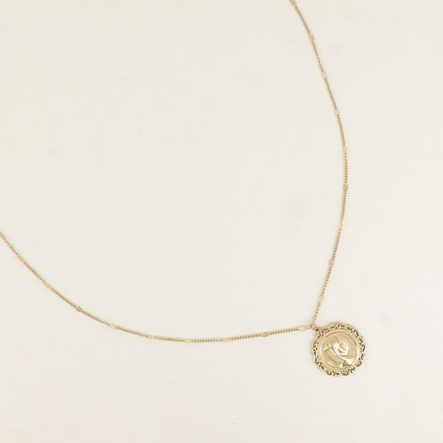 Collier - gravure de la Vierge de profil