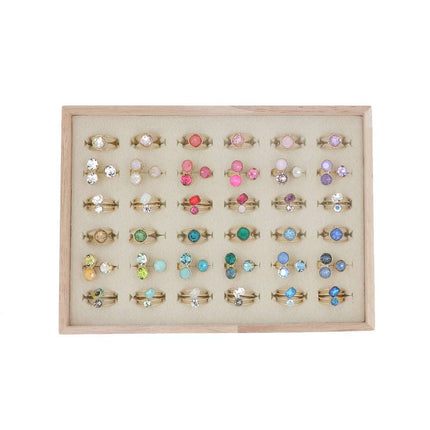 Kit de 36 bagues Swarovski® - doré multi- prix moyen de 7,2€/pc - présentoir offert