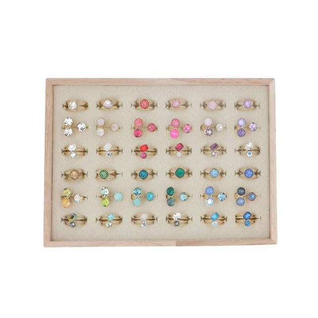 Kit de 36 bagues Swarovski® - doré multi- prix moyen de 7,2€/pc - présentoir offert
