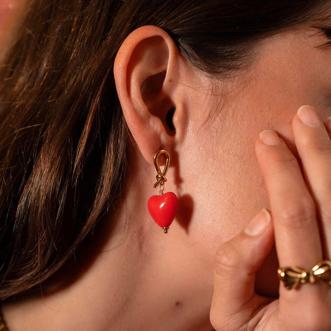 Carleeni drop earrings - knot and heart in acetate