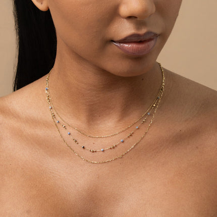 Three-strand necklace - alternating curb and fine links with pearls and cubic natural stones