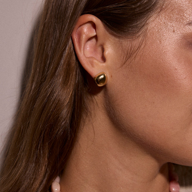 Stud earrings - elongated, domed pear shape
