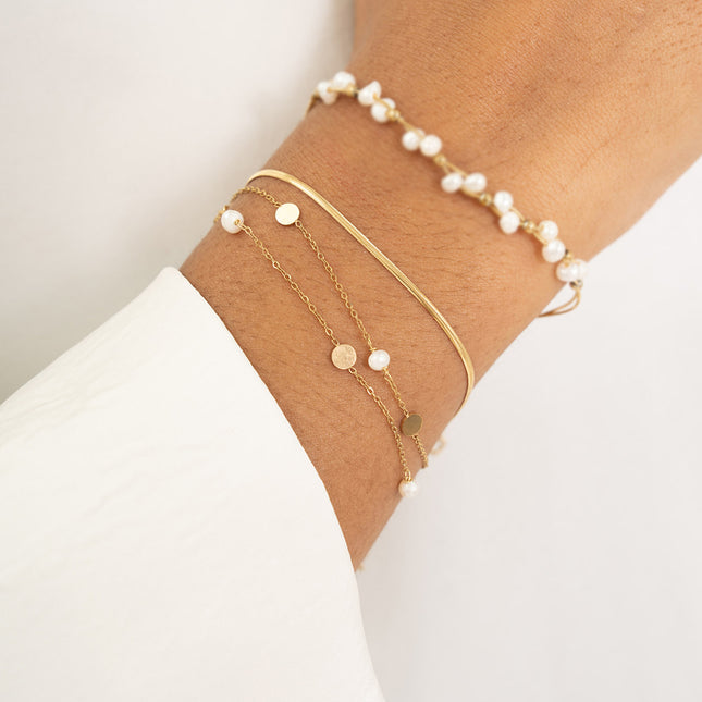 Multi-strand bracelet - round discs and freshwater pearls
