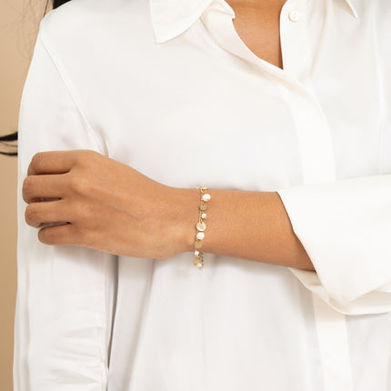 Bracelet - long links, freshwater pearls and round tassels