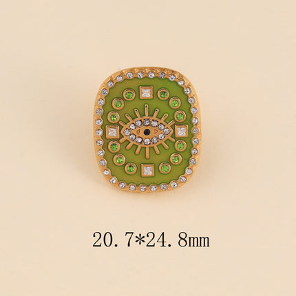 Pin's - médaillon rectangulaire émaillé, oeil avec cristaux