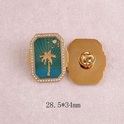 Pin's - grande pièce, palmier sur fond d'émail, oxydes de zirconium