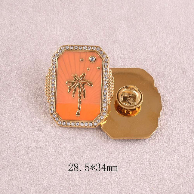 Pin's - grande pièce, palmier sur fond d'émail, oxydes de zirconium