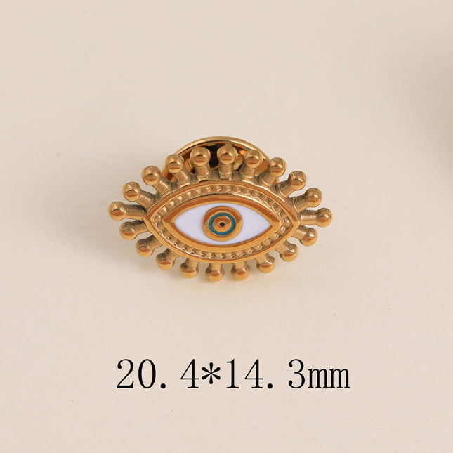 Pin's - oeil émaillé aux contours effet perlés