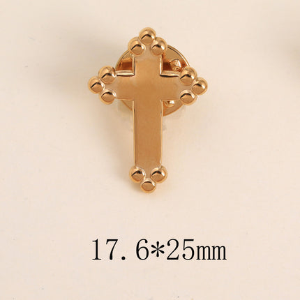 Pin's - croix religieuse à finition perlée
