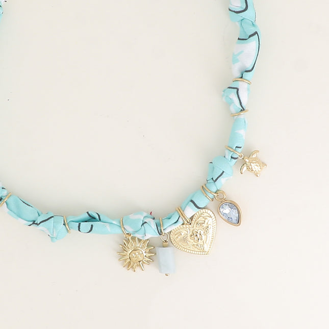 Collier sur tissu ruban - soleil, pierre naturelle, coeur avec gravures, cristal et tortue