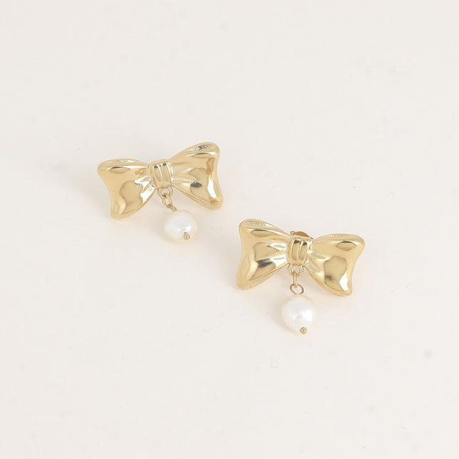 Boucles pendantes - noeud papillon et perles d'eau douce