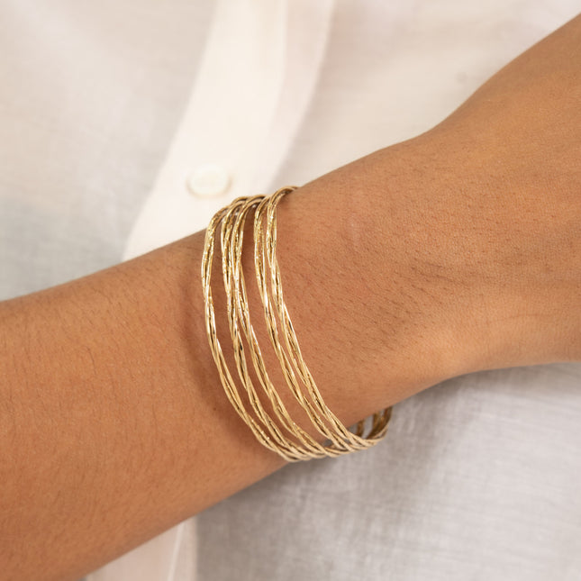 Cuff - 5 twisted and grooved rings