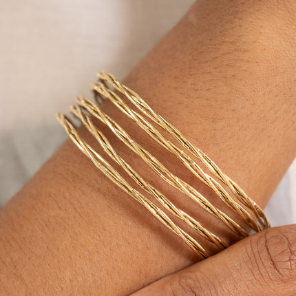 Cuff - 5 twisted and grooved rings