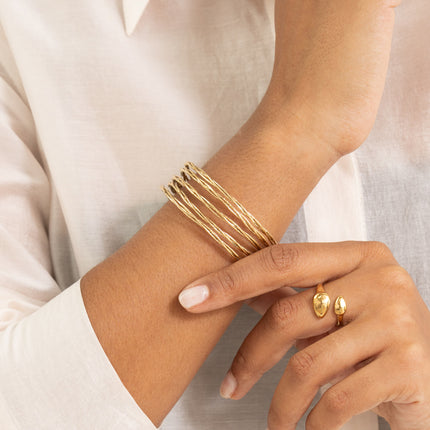 Cuff - 5 twisted and grooved rings