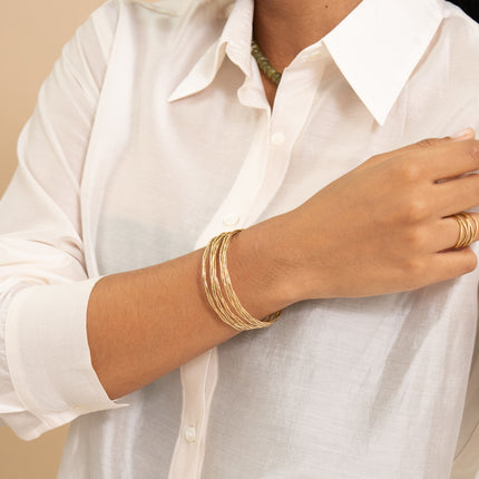 Cuff - 5 twisted and grooved rings