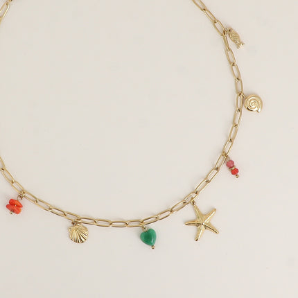 Collier - poisson, coquillages, étoile de mer, coeur, résine