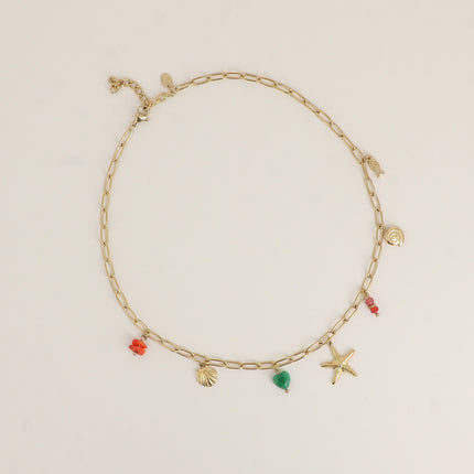 Collier - poisson, coquillages, étoile de mer, coeur, résine