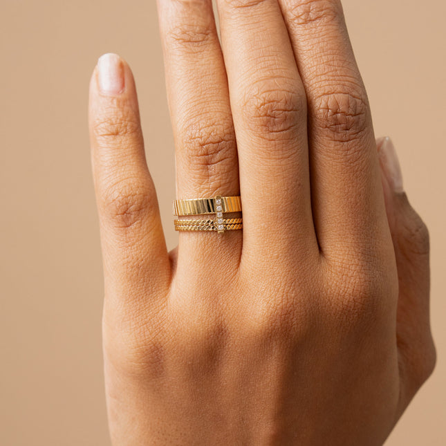 Ring - 3 ridged bands and bar adorned with cubic zirconia