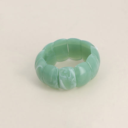 Bracelet élastique - pièces en résine colorée 32mm
