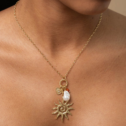 Collier - soleil, perle de résine blanche, coeur et oeil