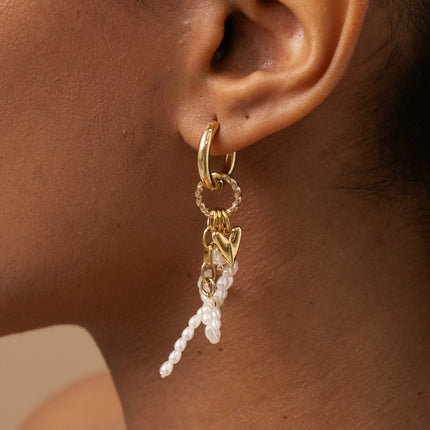 Creole earrings - twisted hoops, bow tie with white resin beads
