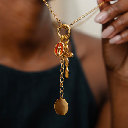 Sautoir Aura - anneau et pendentif croix, la Madone en émail, soleil