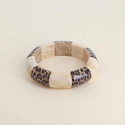 Bracelet élastie - perles en résine et en résine motif léopard