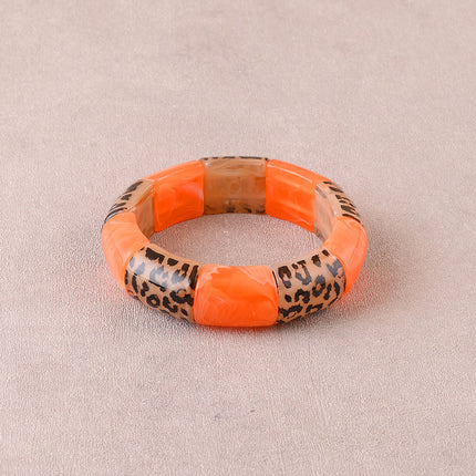Bracelet élastie - perles en résine et en résine motif léopard