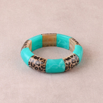 Bracelet élastie - perles en résine et en résine motif léopard