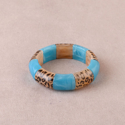 Bracelet élastie - perles en résine et en résine motif léopard