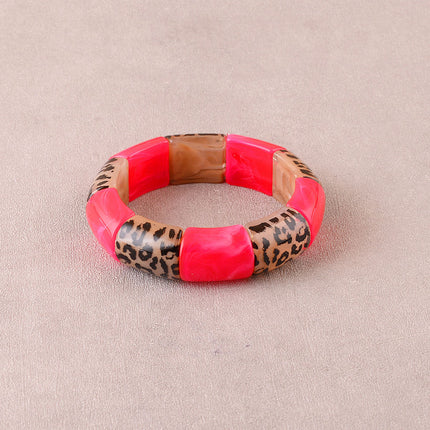 Bracelet élastie - perles en résine et en résine motif léopard