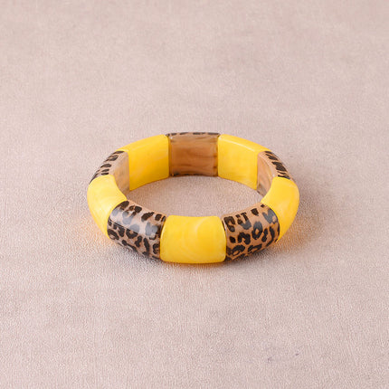 Bracelet élastie - perles en résine et en résine motif léopard